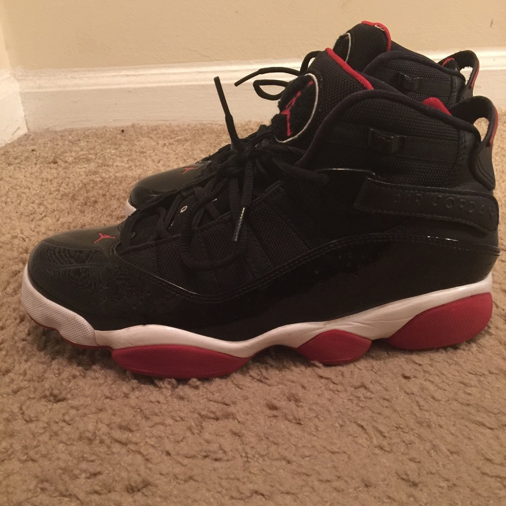 Black and red six ring Jordan's