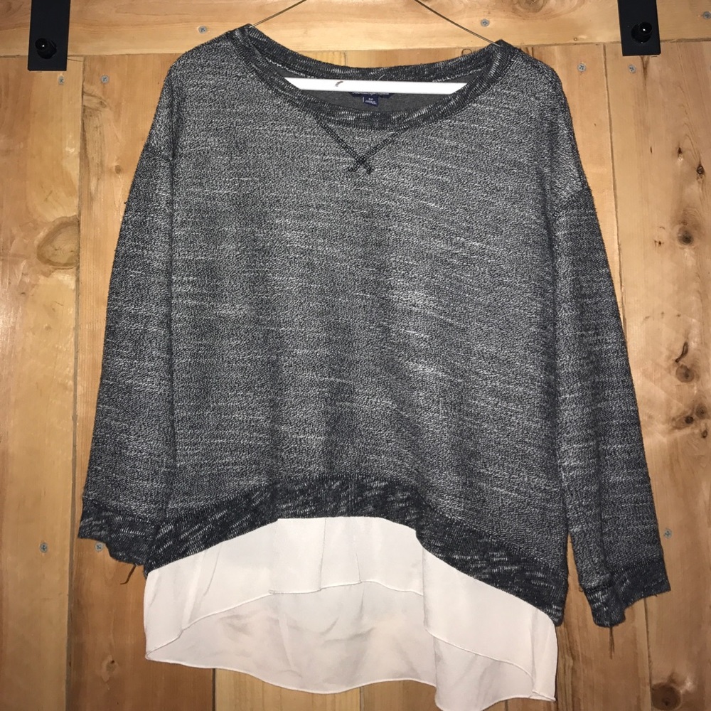 Super cute sweater with cute material under