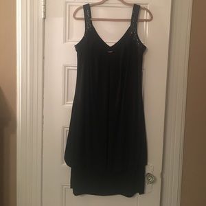 Black dress with beaded straps.
