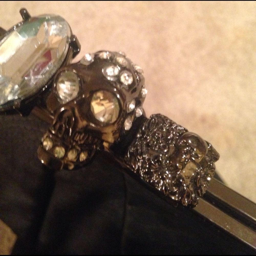 Black skull knuckled clutch bag