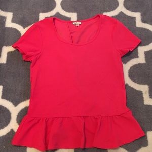 Coral peplum top with ruffle back
