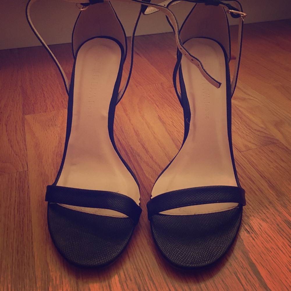 Black snakeskin heels