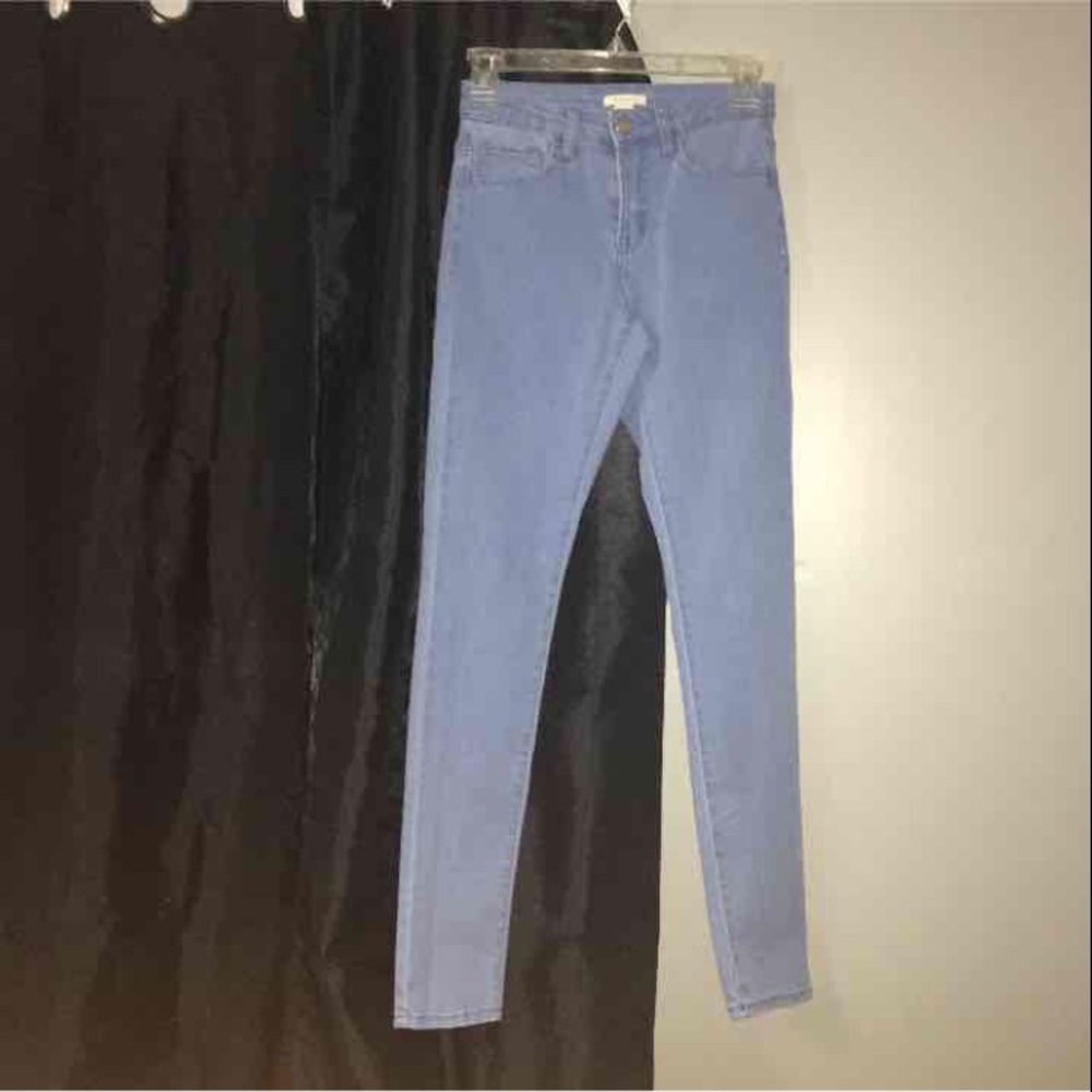 High waisted light blue jeans