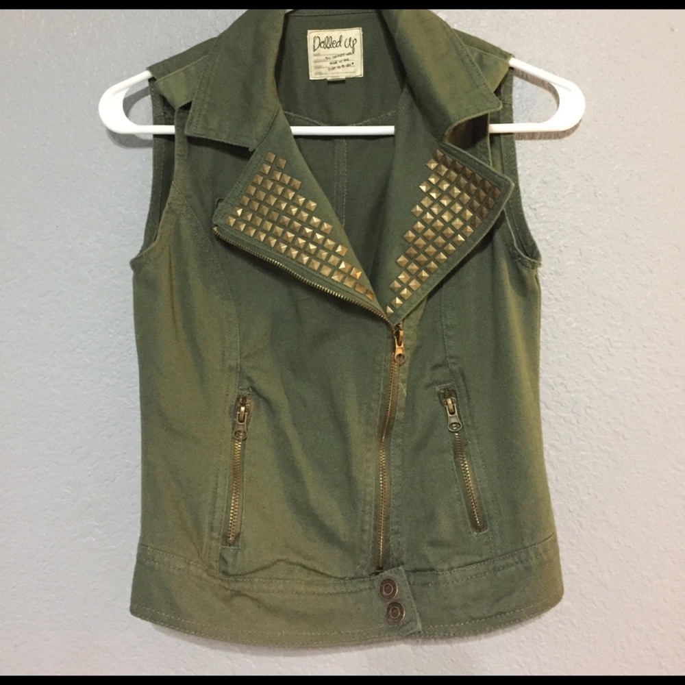 Green sleeveless studded vest