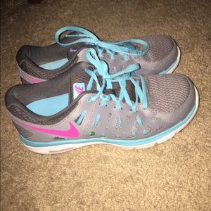 Gray with blue and pink Nikes