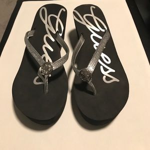 Guess platform flip flops