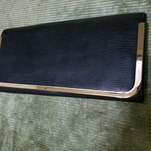 Aldo black and gold detail clutch