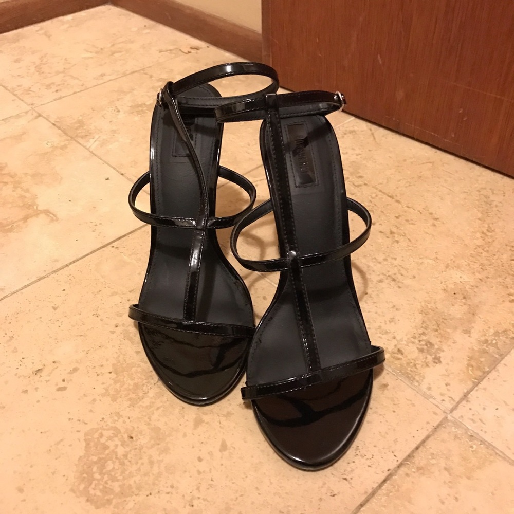 Black strap of high heels