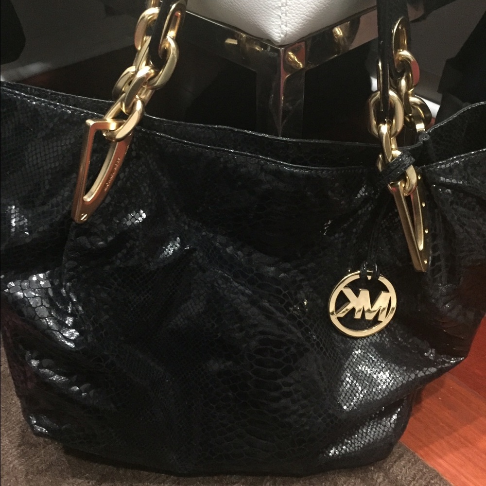 Authentic Michael Kor's black leather bag