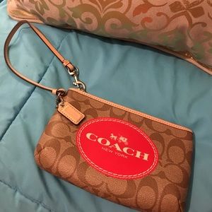 New beige coach wristlet