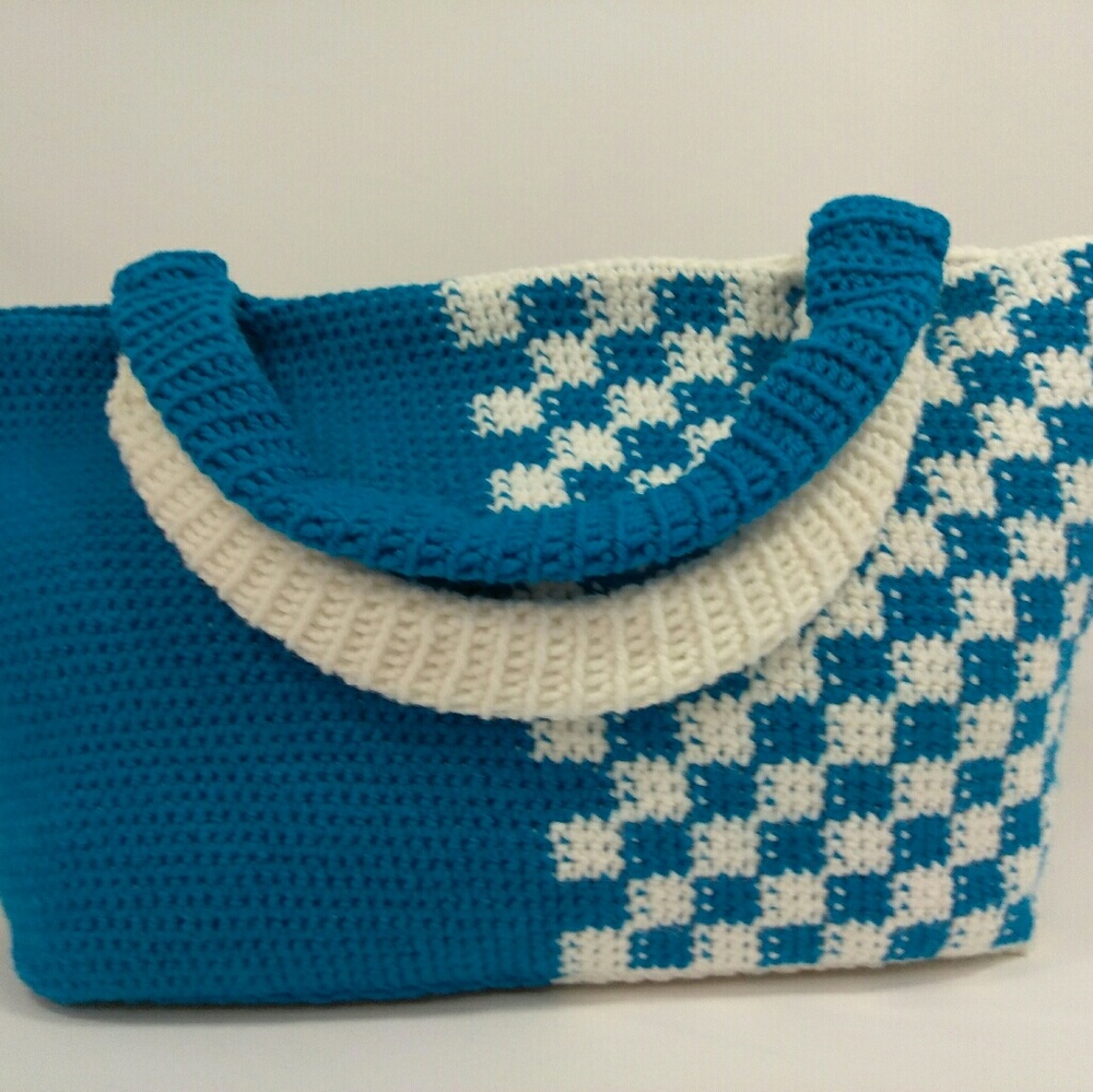 Half regular and half checker crochet handbag