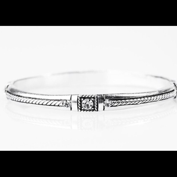 Jewelry - Bangle with clear gemstone.