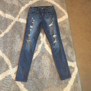 Distressed high rise American eagle size 4