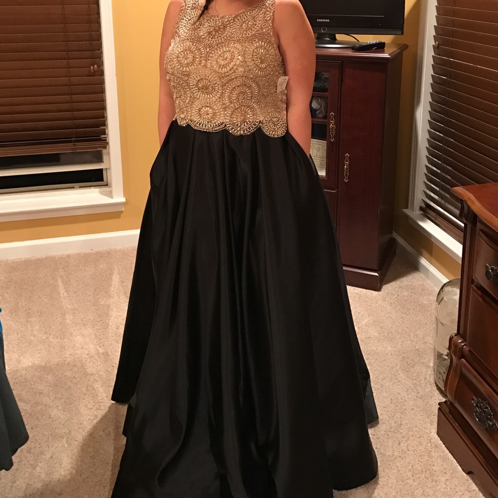 Black designer two piece prom dress.