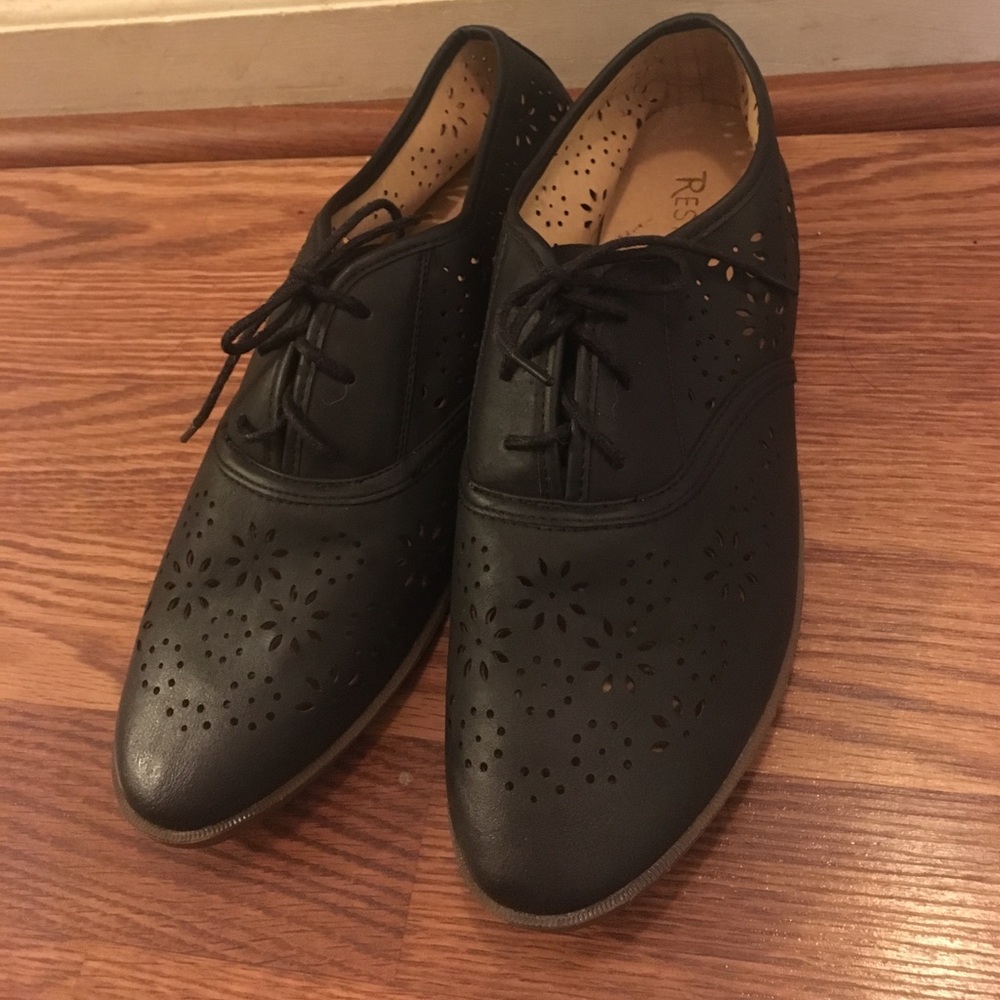 Black oxford style shoes