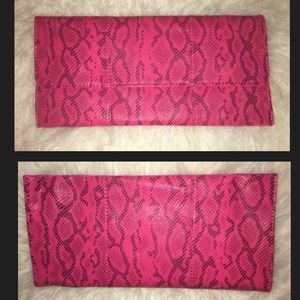 Hot pink snake skin clutch