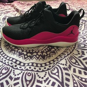 Pink and White Jordan's / athletic shoes