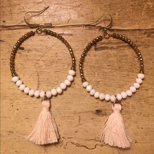 Hoop with fringe statements earrings