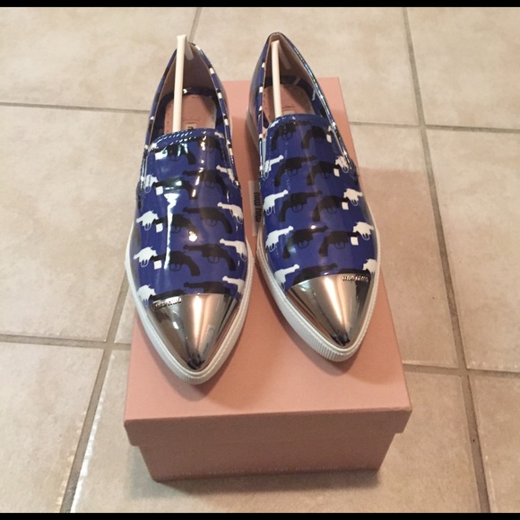 Miu Miu Shoes - Brand new in box Miu Miu pistol flats size 36.
