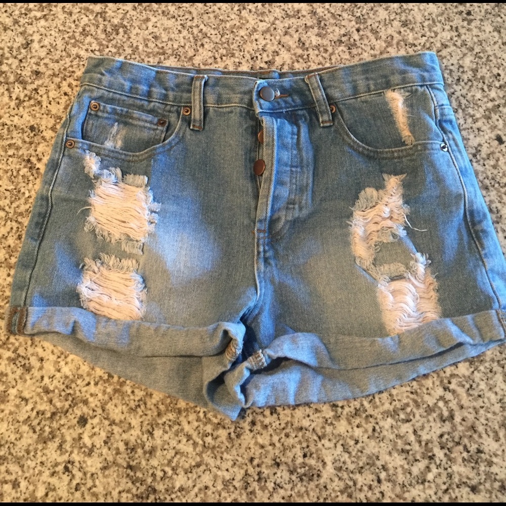 High waisted button up distressed shorts