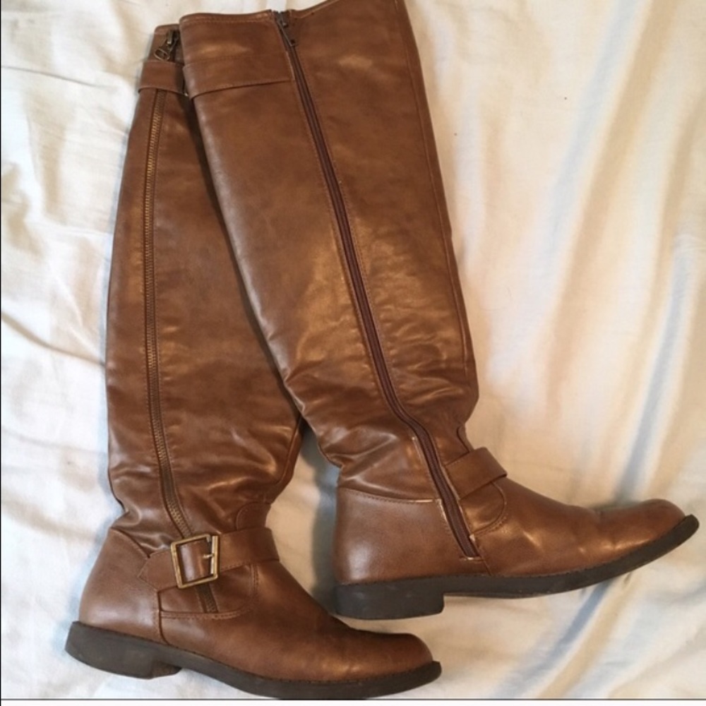 Brown knee high boots with gold buckle & side zip