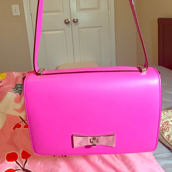 Kate Spade Hotpink cuteee bag with metal bow tie