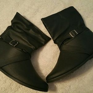 Black buckled ankle boots