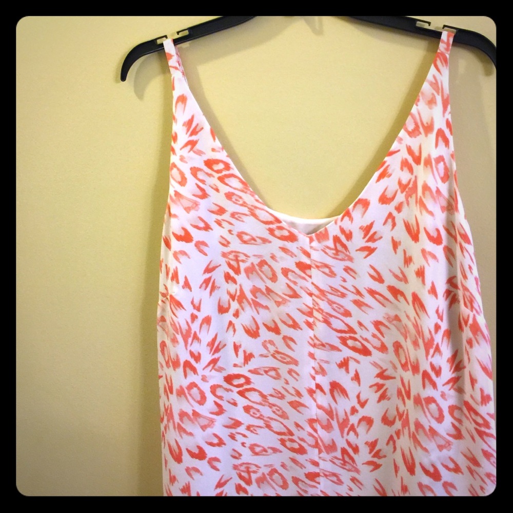 100% polyester layered dress up/dress down tank.