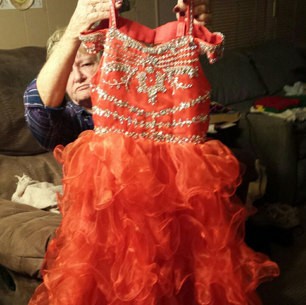 This orange dress is brand new