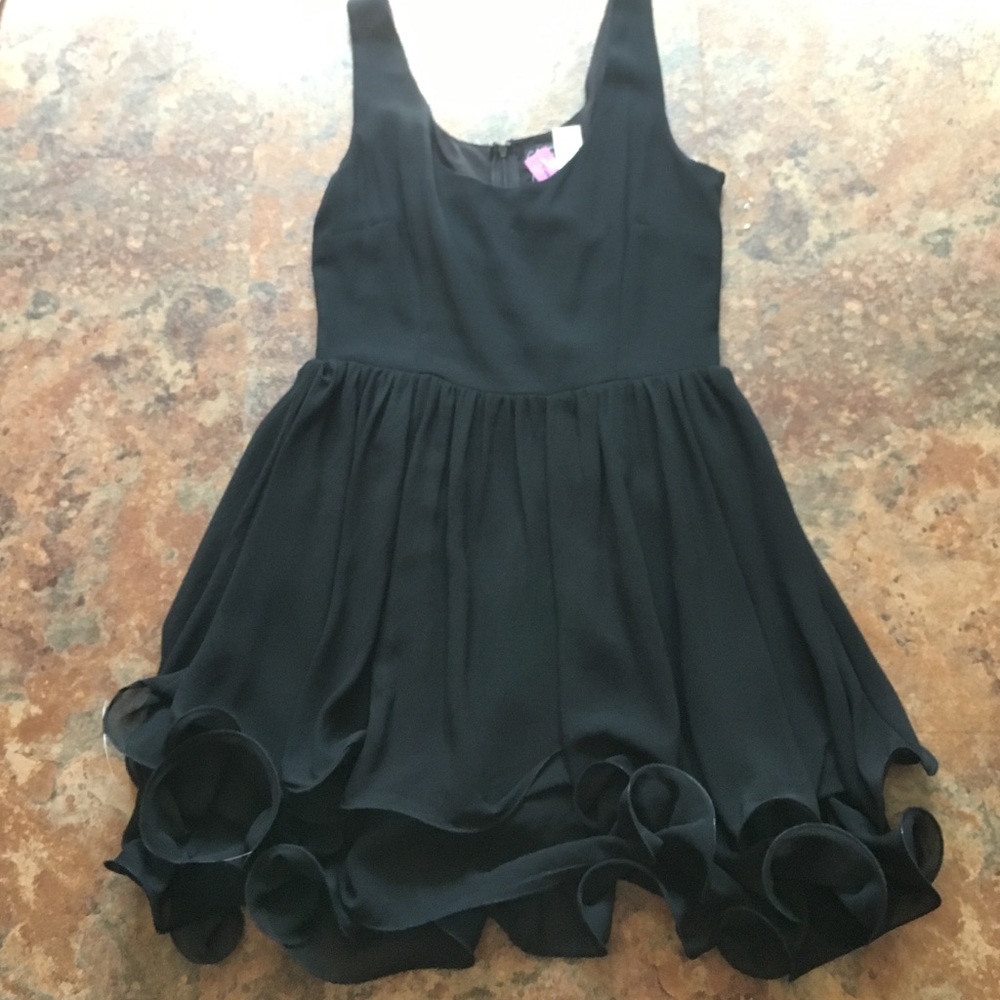 Black dress with ruffles at the bottom