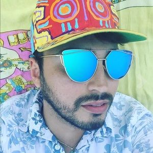 Light blue and gold cat eye sunglasses