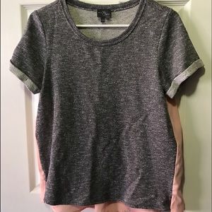 Fun short sleeve top, sheer in back.