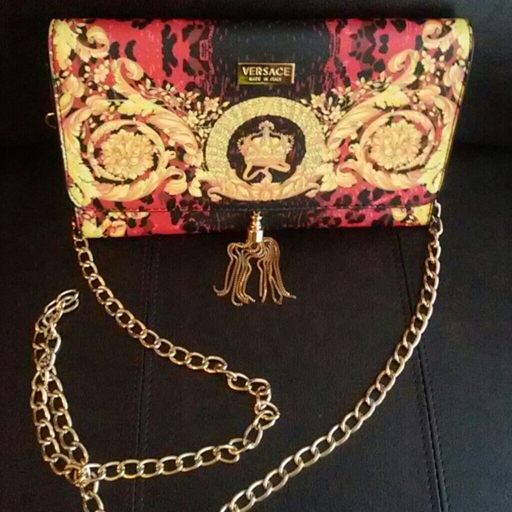 Versace Clutch with long Gold chain.. Share Please