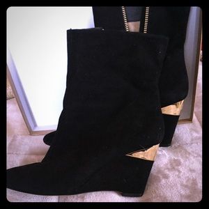 Suede boots.