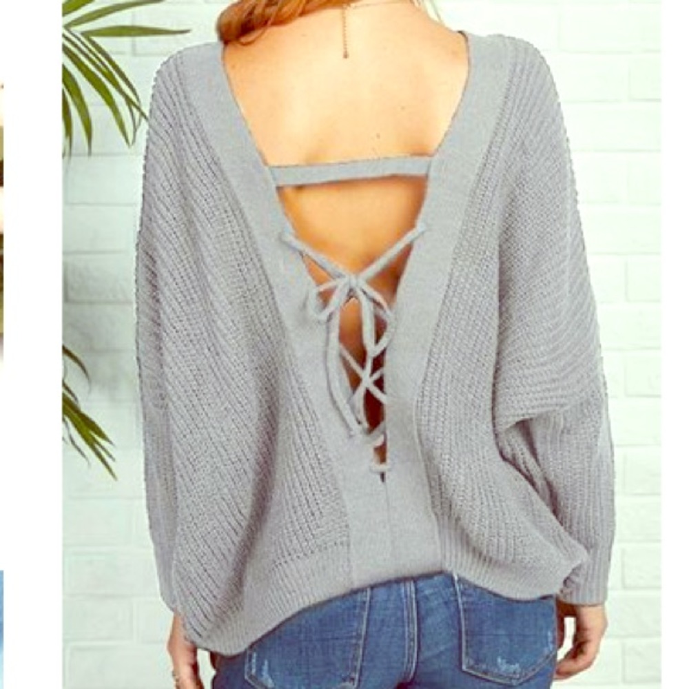 Grey knit sweater with tie back