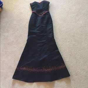 Stunning dress by "Precious Formals" size 2