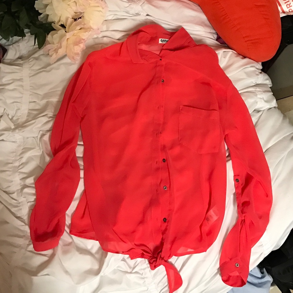 Coral color button up.