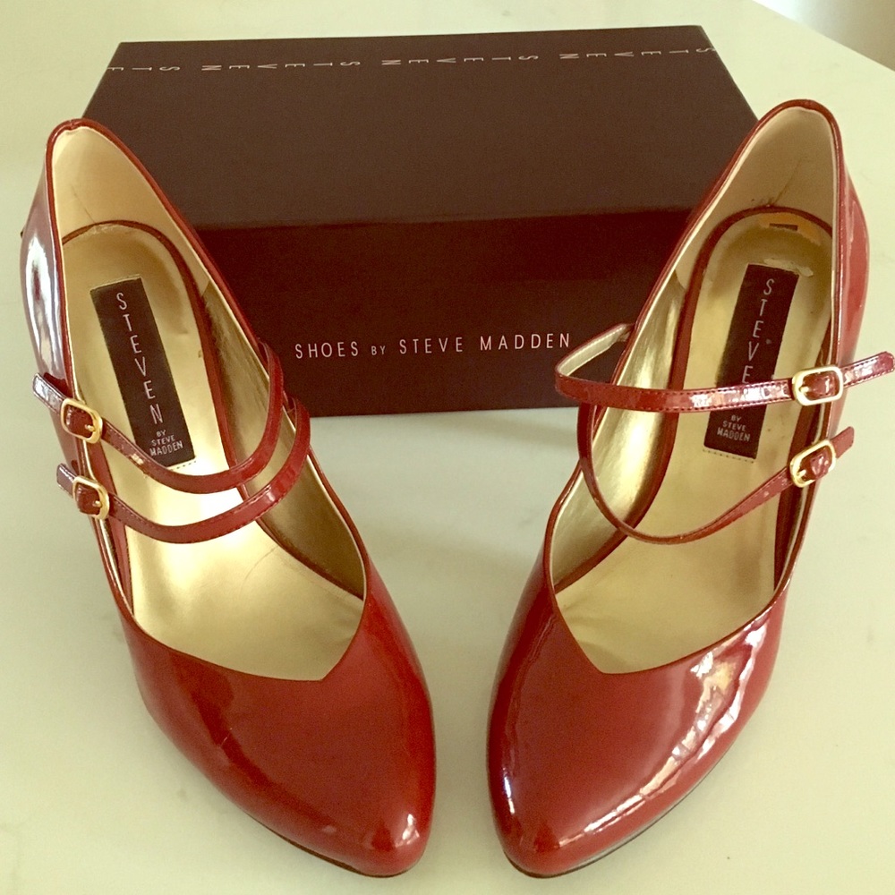Red patent leather STEVEN by Steve Madden heels.