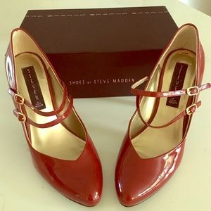 Red patent leather STEVEN by Steve Madden heels.