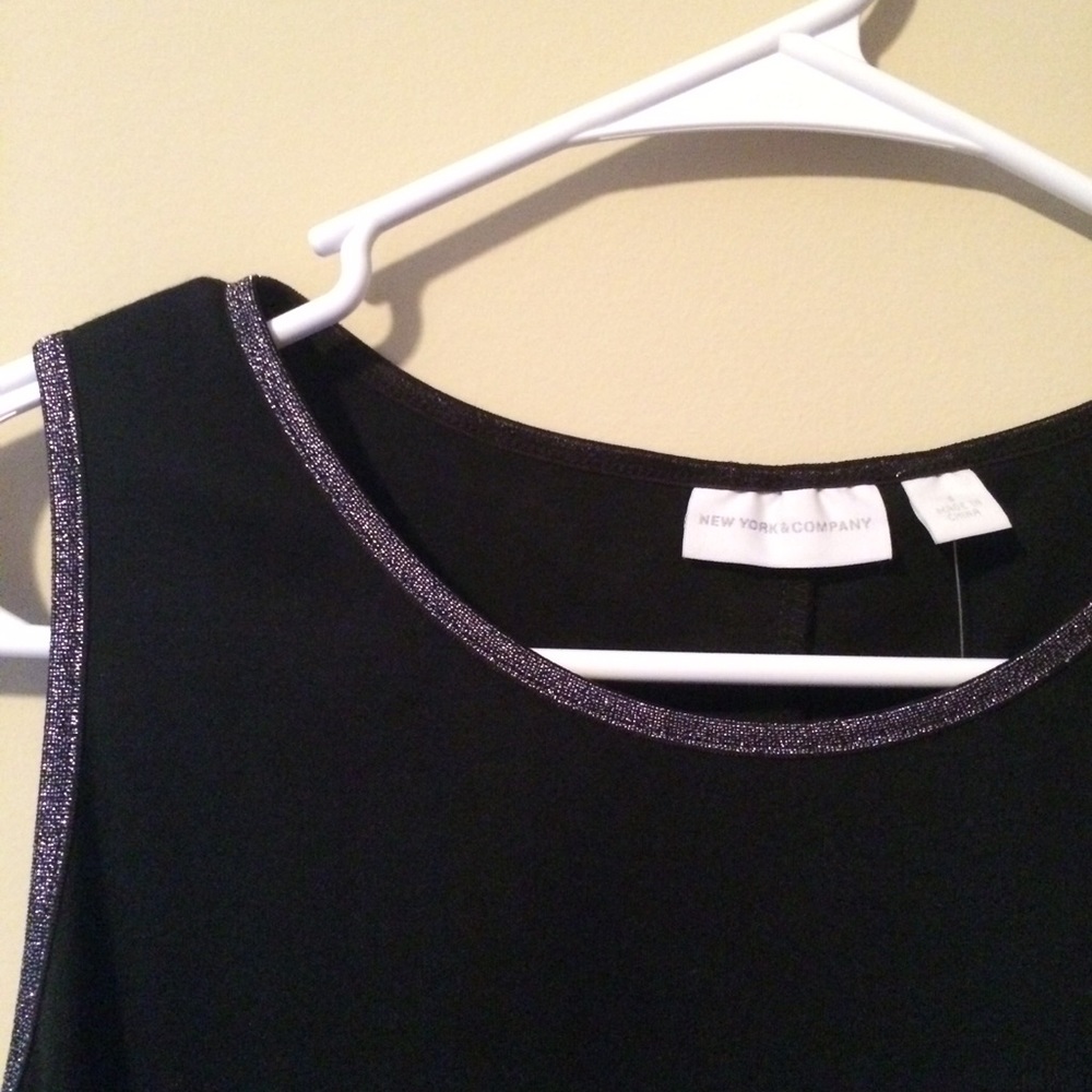 Sleeveless black dress with glitter detailing NWT