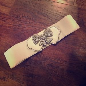 White bow belt