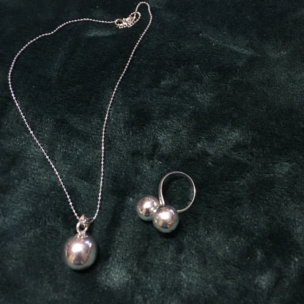 Silver double ball ting