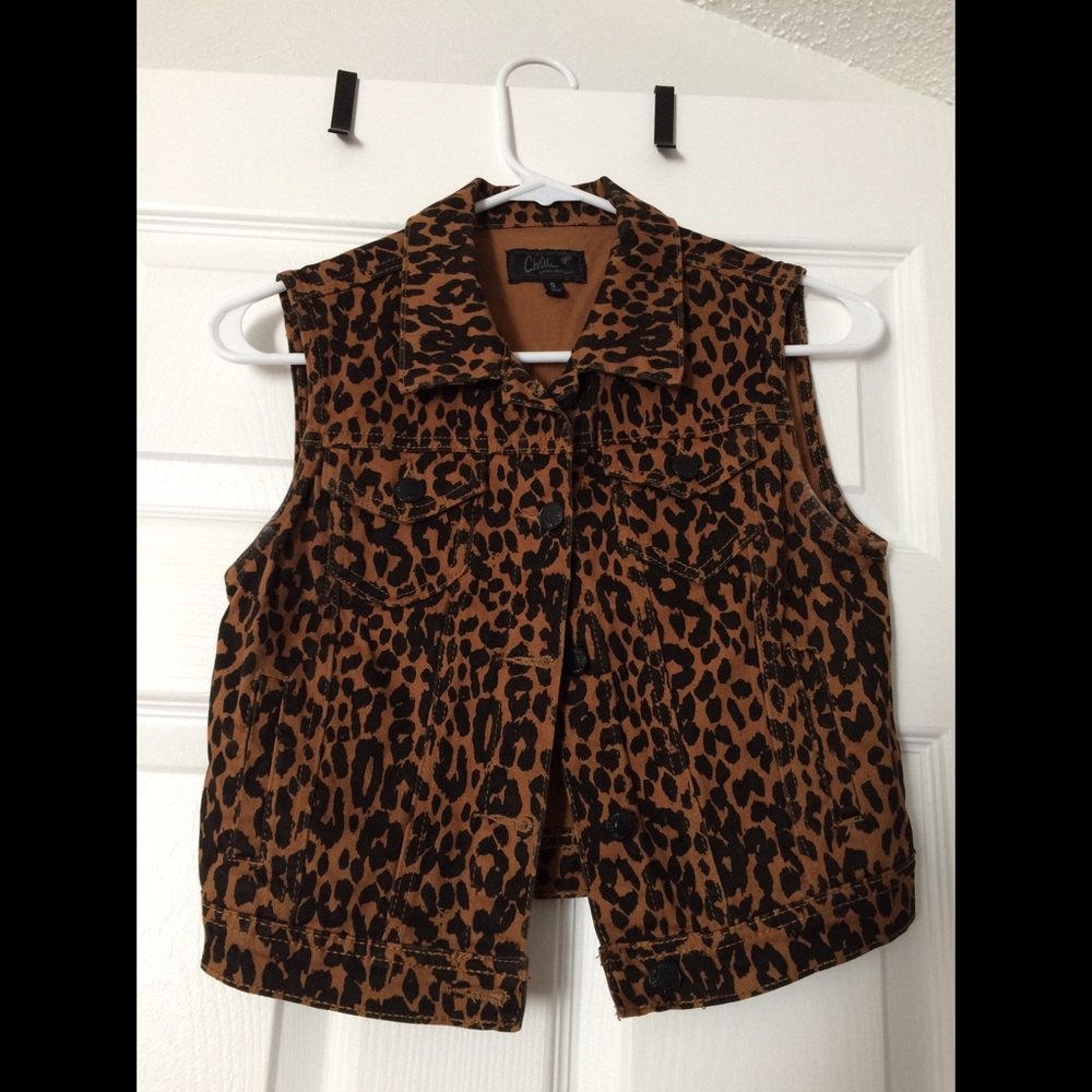 Cheetah print vest.