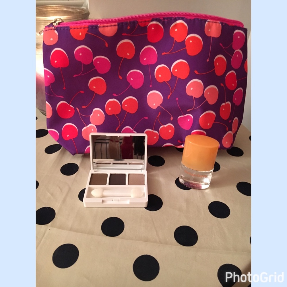 Clinique perfume, eyeshadow and makeup bag