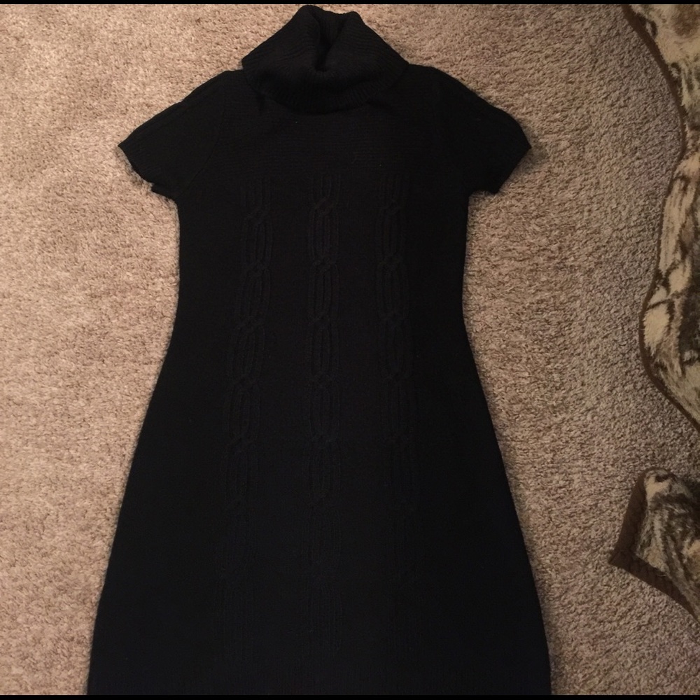 Black turtle neck sweater dress.
