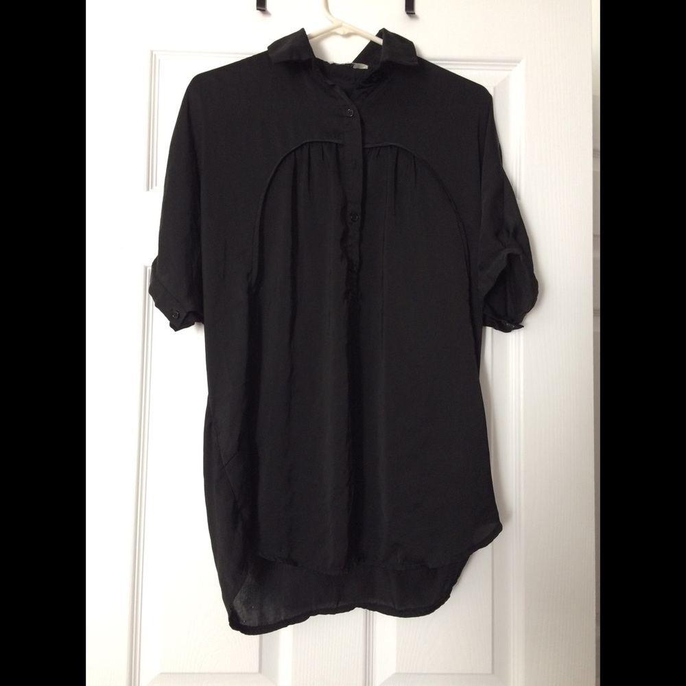 Black open back blouse.