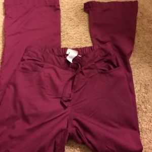Greys anatomy size small scrubs a burgundy color