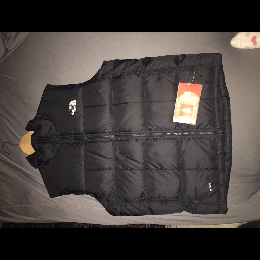 Men's down North Face vest, brand new with tags !