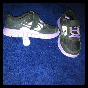 Purple and black girl Nike shoes
