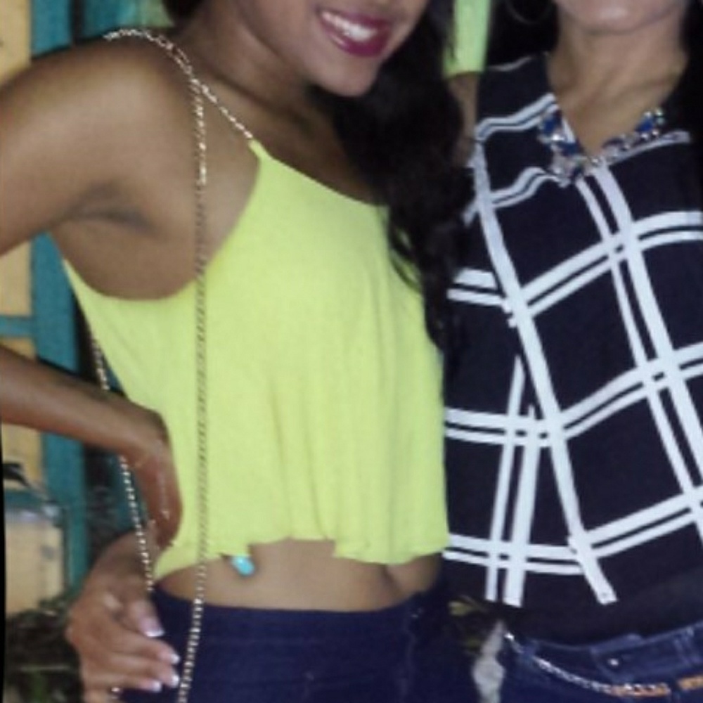 Lime yellow crop with gold chain link straps.